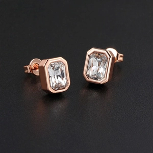 Elegant rose gold geometric rectangle zircon stud earrings for women on black background