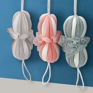 Hanging dual-color loofah sponges in grey, pink, and green with mesh texture