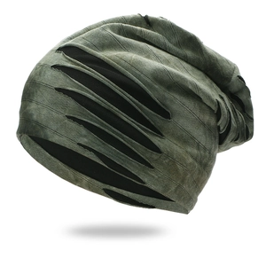 Distressed army green tie-dye beanie with ripped texture for outdoor skiing and sports