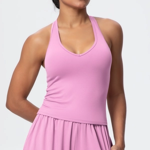 Detailed view of pink brushed fast-dry fabric on backless V-neck athletic sports top