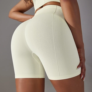 Vista posteriore dei pantaloncini yoga senza cuciture a vita alta con trama a nido d'ape