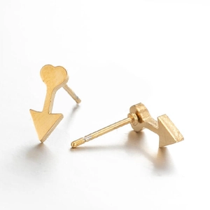 Minimalist gold arrow heart stud earrings with secure metal butterfly backs on white background