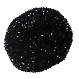 Top view of black velvet beret featuring reflective sequins on a clean white background
