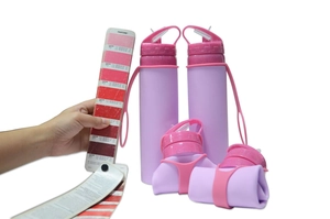 600ml collapsible silicone water bottle shown in both expanded and folded states