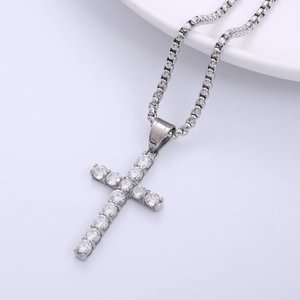 Silver cross pendant necklace with sparkling cubic zirconia on a round box chain