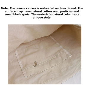 Detailed view of the unbleached canvas interior lining with a practical zipper pocket