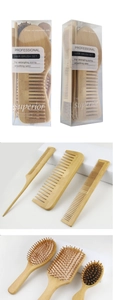 Detailed view of bamboo hairbrush set including wide tooth comb and paddle brushes