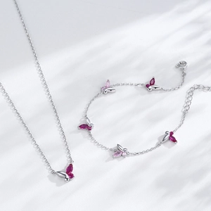 Parure élégante en argent S925 avec collier et bracelet papillon aux gemmes roses