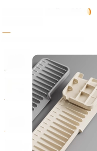 Detailed view of dual-sided silicone drainage mat with textured surface and non-slip ridges