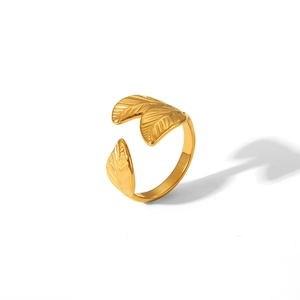 Detailed macro view of golden adjustable open ring featuring triple layered leaf design