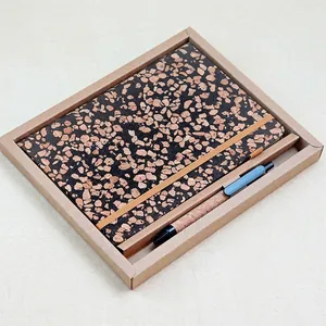 Eco-friendly A5 cork notebook and pen set in a minimalist kraft paper gift box