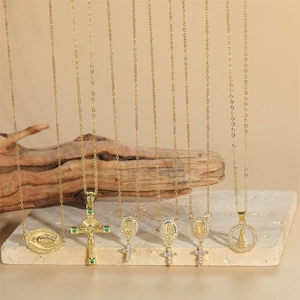 Minimalist gold plated cross and Virgin Mary medallion necklace collection for women