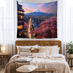 Detail of Mount Fuji tapestry featuring cherry blossoms in a warm bedroom setting