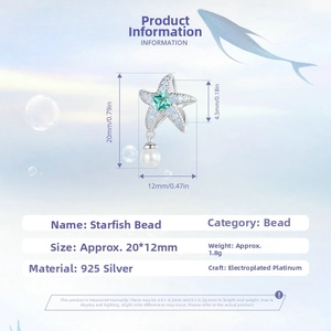 Detailed view of s925 silver starfish charm with green gemstone and white pearl dangle