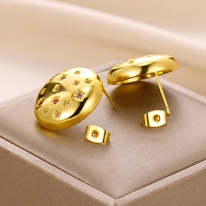 French style gold starburst stud earrings featuring colorful zircon stones and domed metal