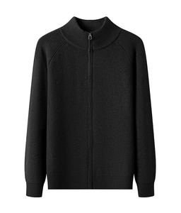 Detail of black rib-knit texture and zipper closure on men's business casual cardigan