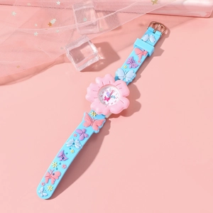 Detail of pink flower-shaped watch case and blue silicone strap with 3D butterfly patterns