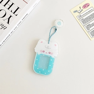 Detail of blue and white acrylic magnetic cartoon photo frame charms with beaded chains