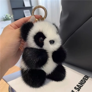 Plush panda keychain made of premium faux mink fur with a luxury gold metal ring clasp