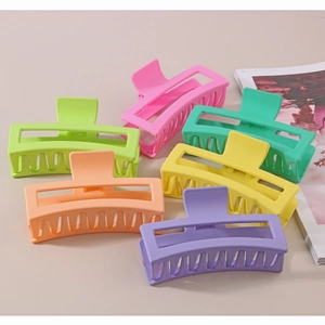 Macro shot of 13cm matte rectangle hair claws in assorted macaron colors for thick hair