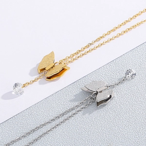 Elegant gold and silver butterfly pendant necklaces with round cubic zirconia crystals