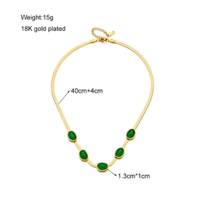 Vintage 18K gold-plated snake chain necklace with five oval emerald green gemstones