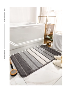 Tapis de bain rayé en peluche dégradé gris et blanc avec texture douce et antidérapant