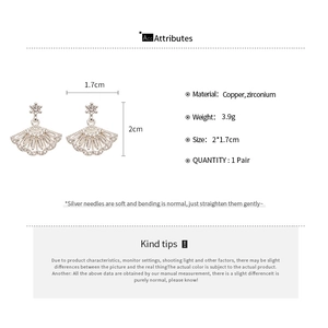 Macro shot of silver fan-shaped zircon earrings with detailed size and material specs
