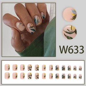 Short square floral press-on nails with tropical leaf patterns and nude pink base