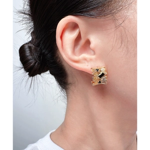 Luxury gold C-shape hoop earrings with black zircon stones and irregular stripe texture