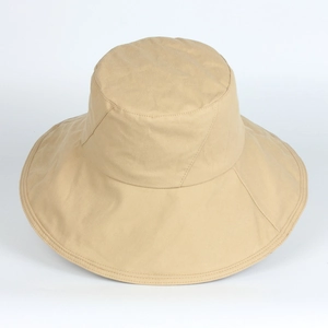 Detailed texture of cotton canvas sun hat with wide brim and uniform decorative stitching