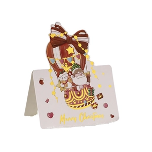 3D Pop-up Christmas card with gold hot stamping and cute Santa on a hot air balloon