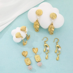 Creative gold sea animal stud earrings with seahorse shell pearl charms for women