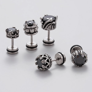 Close-up of stainless steel stud earrings with crown setting and black cubic zirconia