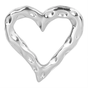 Macro shot of silver heart pendant with textured finish in polished stainless steel
