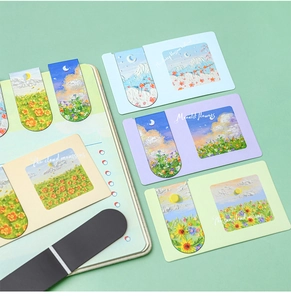 Macro detail of magnetic bookmarks featuring 3D oil painting textures and scenic art