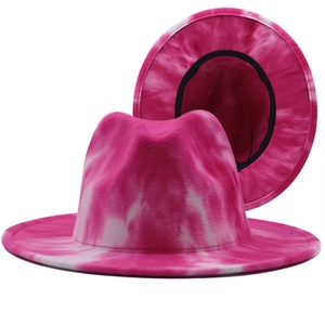 Pink and white tie-dye wide-brim felt fedora hat with classic indented crown and flat brim
