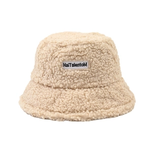 Creamy white sherpa bucket hat for women with embroidered letter patch for winter warmth