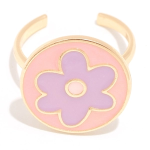 Macro shot of an adjustable gold-plated ring with a purple and pink enamel flower charm