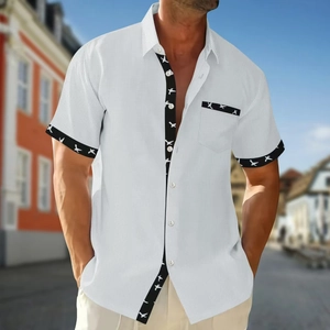 Men's white waffle knit short sleeve shirt with black bird print trim and button-down collar