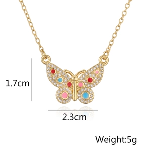Detailed view of butterfly pendant with colorful zircons, size 1.7cm x 2.3cm, weight 5g