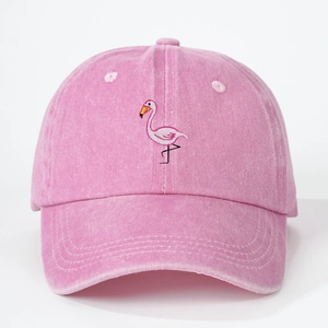 Pink washed cotton baseball cap with flamingo embroidery featuring a soft top design