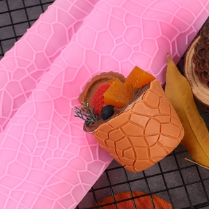 Macro shot of large tree bark texture silicone mold with a finished chocolate piece