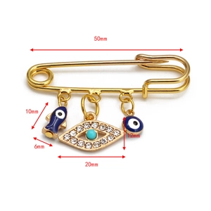 Detailed size specifications for the gold evil eye safety pin brooch with charms