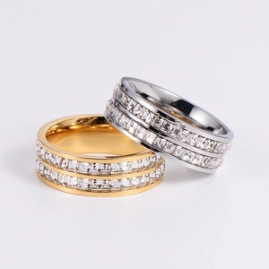Polished double row cubic zirconia rings set in silver and gold finishes for couples