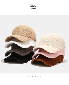 Close-up of fluffy teddy fleece baseball caps in seven neutral and pastel colors