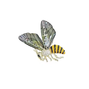 Sparkling insect honeybee brooch with rhinestones and yellow enamel on white background