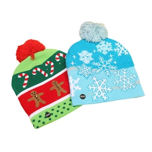 Knitted Christmas LED hats with gingerbread man and snowflake patterns and pom-poms