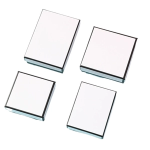 White cardboard jewelry gift boxes with black trim in square and rectangular shapes