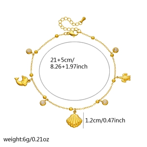 Gold stainless steel anklet with dolphin, turtle and shell pendants on white background